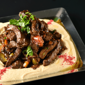 HUMMOS TOPPED WITH MEAT